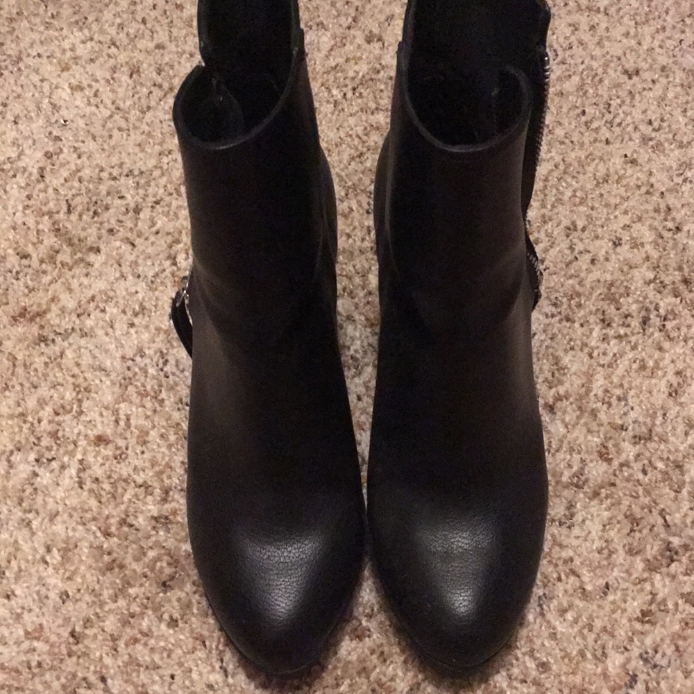 High black boots with silver zippers